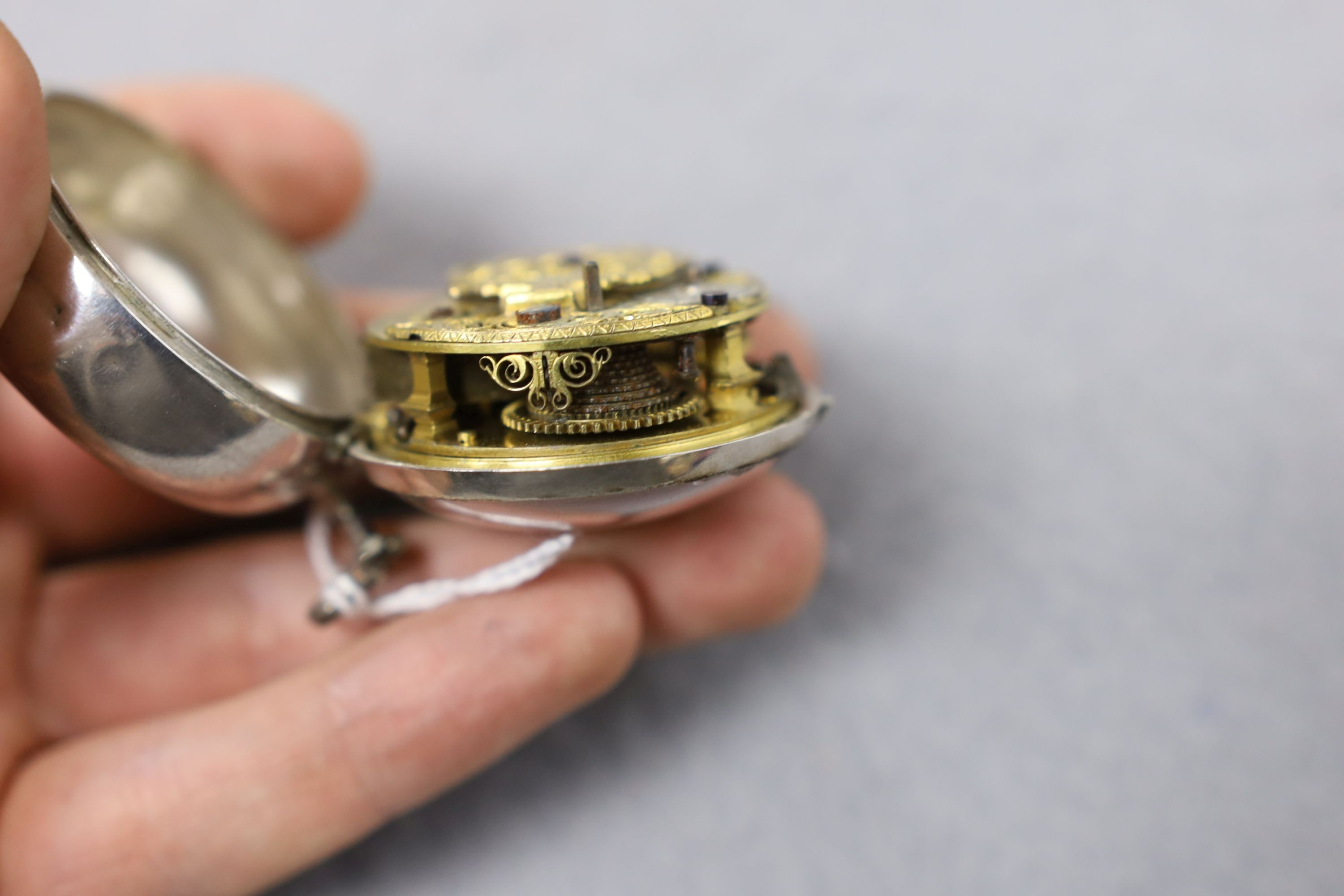 An 18th century white metal pair cased keywind verge pocket watch, by Isaac Soret, cased diameter 51mm